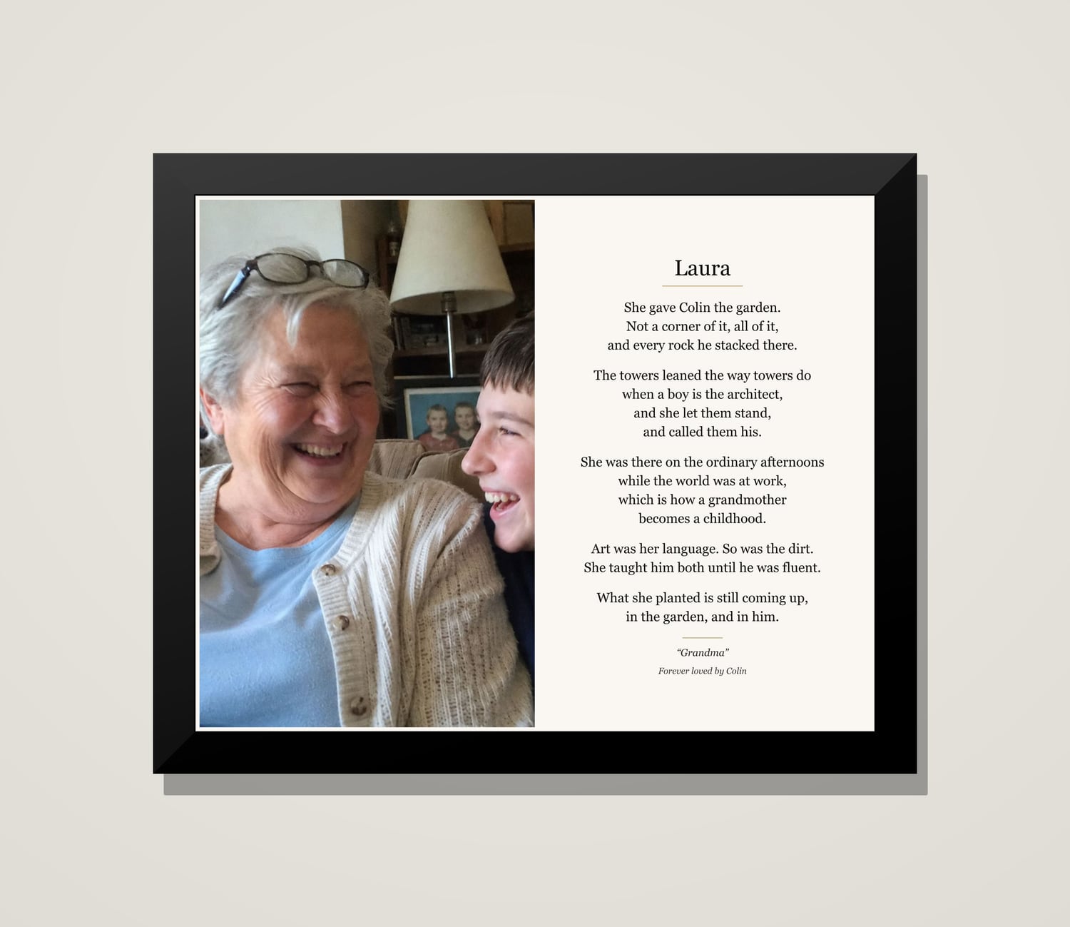 A framed tribute to Laura, a grandmother, beside a photograph of her laughing with her grandson